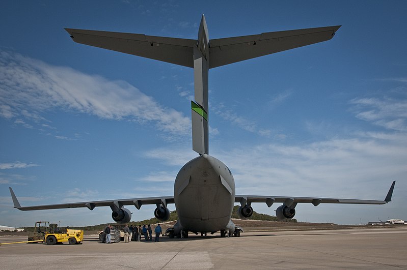 File:Members of the Fort Hood Arrival-Departure Airfield Control Group (A-DACG) prepare to unload two AH-64D Apache Longbow helicopters out of a C-17 Globemaster III cargo plane at Robert Gray Army Airfield, Texas 131114-A-ZU930-020.jpg