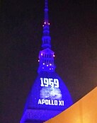 La Mole Antonelliana illuminata per il cinquantesimo anniversario della Missione Apollo XI