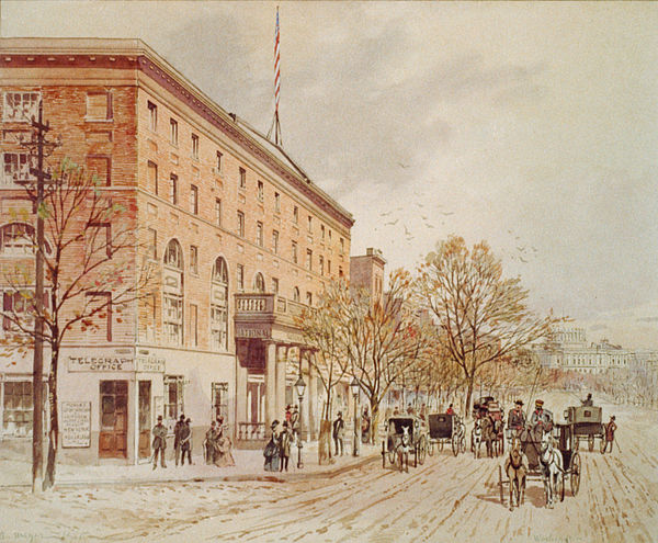 An 1860 watercolor of Pennsylvania Avenue at 6th Street with the not yet finished United States Capitol in the distance and the National Hotel on the 