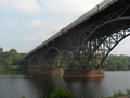 The Strawberry Mansion Bridge, built 1896-97, is a steel arch bridge across the Schuylkill River in Fairmount Park in Philadelphia, Pennsylvania, in the United States. Looking from the Kelly Drive.