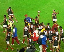 Papua New Guinea's Mosquitos celebrate taking the International Cup from New Zealand to become International champions in 2008 Png victory 3.jpg