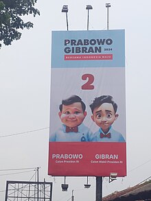 Prabowo-Gibran AI-generated portrait campaign billboard (taken on 24 November 2023) Prabowo-Gibran Baliho 2023.jpg