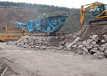Crushing concrete from an airfield Recycling an airfield N03 - geograph.org.uk - 379756.jpg