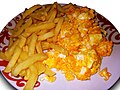 Scrambled eggs with french fries