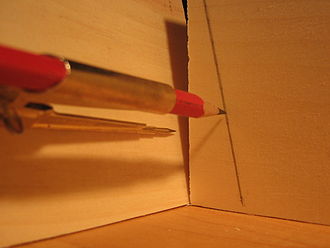 Scribing a pencil line to fit two pieces of wood together. Scribe line A.jpg