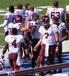 Glennon is congratulated by Eddie Royal after leading the Hokies to a touchdown in his first drive off of the bench in relief of the injured Tyrod Taylor Sean Glennon congratulated.jpg