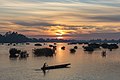 71 Silhouette of a fisherman on his pirogue at sunrise in Si Phan Don Laos uploaded by Basile Morin, nominated by Basile Morin