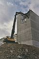 An excavator demolishing a grain elevator at former SOK mill in Toppila, Oulu, Finland