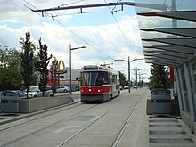 A CLRV streetcar operating on a reserved track on route 512 St. Clair. Dedicated right-of-way lanes were completed on route 512 in 2010. Streetcar arrives at Keele from Gunns Loop.JPG