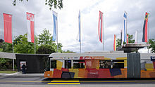 Articulated TOSA bus TOSA Bus at PALEXPO with flag.jpg