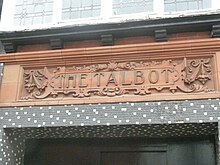 Terracotta panel above the Queen Street entrance Talbot Inn, Wrexham.jpg