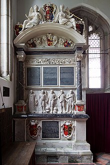 Monument in Lamerton Church, Devon, erected in 1588 by Degorie Tremayne in memory of six of his deceased brothers, with statues of five, one having died an infant. Only his brother John Tremayne was then still living, who is therefore not featured on the monument TremayneMonument LamertonChurch Devon.jpg