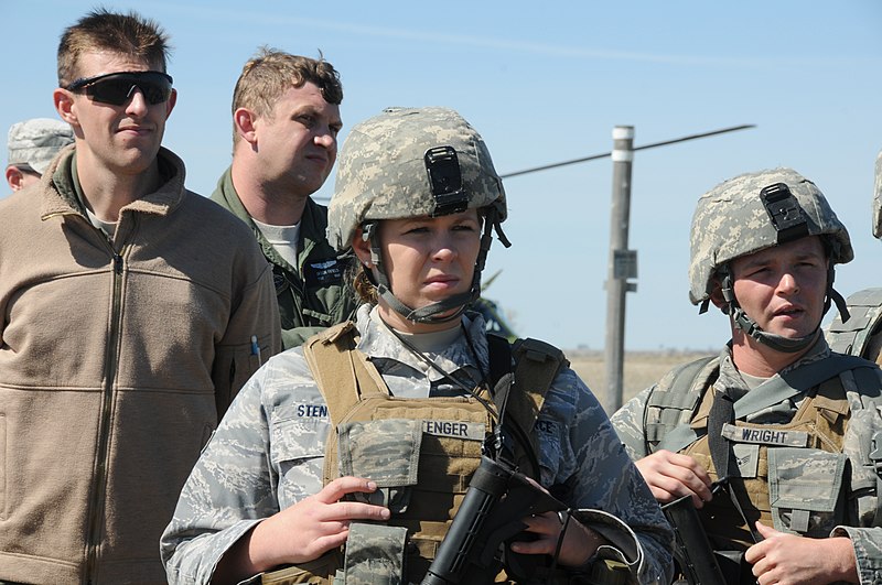 File:U.S. Air Force Senior Airman Kathleen Stenger, center right, and Senior Airman James Wright, right, both with the 219th Security Forces Squadron (SFS), North Dakota Air National Guard, stand among a group 130522-Z-WA217-540.jpg