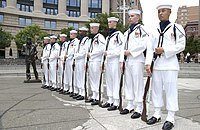 U.S. Navy ceremonial guard wearing white canvas leggings as part of the U.S. Navy's enlisted full dress whites.