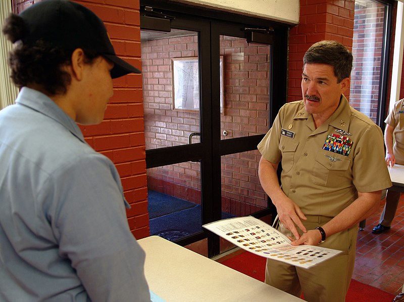 File:US Navy 060518-N-0962S-072 Master Chief Petty Officer of the Navy (MCPON) Terry Scott quizzes a student standing quarterdeck watch on Navy officer and enlisted pay grades.jpg