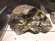 A large sample with mass 26 kg. Exhibited at the National Museum of Natural History in Paris in 2018. Verre libyque, exposition "Meteorites", Museum national d'histoire naturelle.jpg