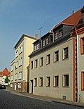 Residential house in a corner position, enclosure wall to the courtyard and gate entrance