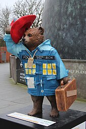 Doctor Who-themed Paddington Bear statue at the Royal Observatory, London, in 2014. Designed by the twelfth Doctor Peter Capaldi, it was auctioned for the National Society for the Prevention of Cruelty to Children (NSPCC). "Paddington Who", Paddington Bear, Royal Observatory - geograph.org.uk - 4282486.jpg
