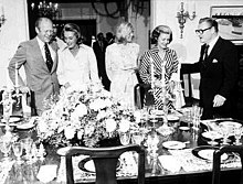 Vice President Rockefeller (right) and his wife Happy (second on left) entertain President Gerald R. Ford (left) his wife Betty (second on right) and their daughter Susan (center) at Number One Observatory Circle on September 7, 1975. 1OCDining.jpg