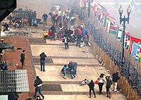 Boston Marathon bombing 1st Boston Marathon blast seen from 2nd floor and a half block away.jpg