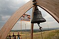 Cemetery for fighters of DPR Vostok Battalion unit called "Medvedevtsi", with an old bell