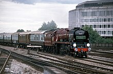 No. 34027 as the Hogwarts Express in July 2000. 34027 Taw Valley TnT 66074 on The Hogwarts Express passes Reading on 08 July 2000 (1).jpg