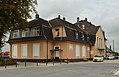 Station entrance building from 1907 with warehouses