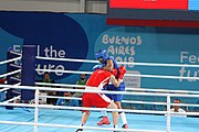 Deutsch: Boxen bei den Olympischen Jugendspielen 2018 Tag 12, 18. Oktober 2018 - Kampf um die Bronzemedaille im Fliegengewicht Mädchen – Timur Merjanow (Usbekistan, rot) schlägt Youssef Ali Karar Ali (Ägypten, blau) 5-0; Ringrichter ist Antonín Gaspar (Tschechien). English: Boxing at the 2018 Summer Youth Olympics on 18 October 2018 – Boy's heavyweight Bronze Medal Bout - Timur Merjanov (Uzbekistan, red) beats Youssef Ali Karar Ali (Egypt, blue) 5-0; Referee is Antonín Gaspar (Czech Republic). Español: Boxeo en los Juegos Olímpicos Juveniles de Verano de 2018 en 18 de octubre de 2018 - Medalla de bronce de peso pesado del muchacho: Timur Merjanov (Uzbekistán, roja) le gana a Youssef Ali Karar Ali (Egipto, azul) 5-0; El árbitro es Antonín Gaspar (Republica checa).