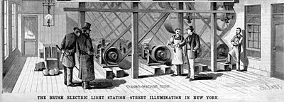 Brush Electric Company's central power plant with dynamos generating direct current to power arc lamps for public lighting in New York. Beginning operation in December 1880 at 133 West Twenty-Fifth Street, the high voltages it operated at allowed it to power a 2-mile (3.2 km) long circuit. Brush central power station dynamos New York 1881.jpg