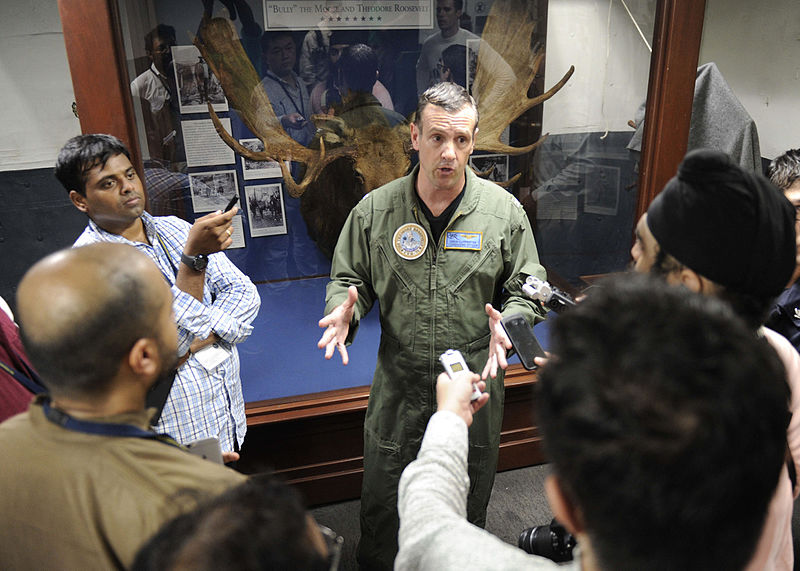File:Capt. Craig Clapperton participates in an interview with the press during Exercise Malabar 2015.JPG
