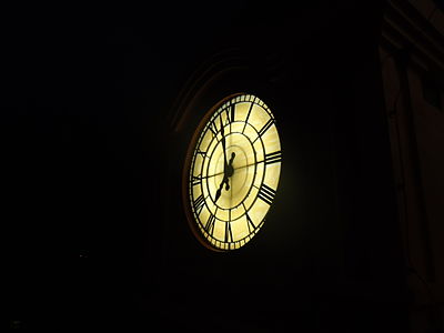 Clock tower clock in night, veegaland amusement park, Cochin, Kerala, India