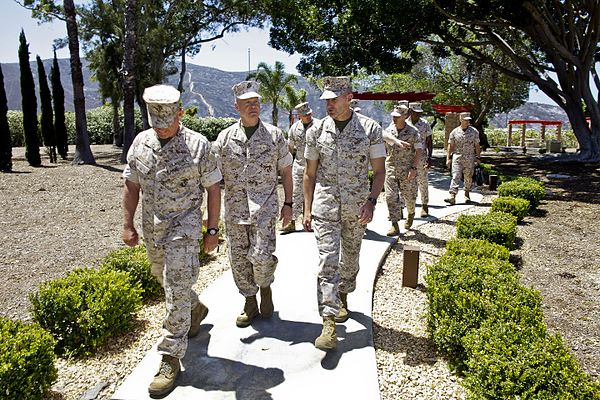 The 35th commandant of the Marine Corps, General James F. Amos, visits the 5th Marine Regiment Memorial during a tour of Marine Corps Air Station Camp