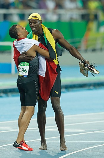 De Grasse and Bolt after running the 100 m final at the 2016 Olympics