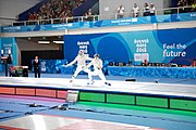 Deutsch: Fechten bei den Olympischen Jugend-Sommerspielen 2018: Tag 1, 7. Oktober 2018, Jungen, Säbel, Finale - Krisztián Rabb (HUN) - Hyun Jun (KOR) (USA) 15:13 English: Fencing at the 2018 Summer Youth Olympics at 7 October 2018 – Boys' sabre Gold medal match – Krisztián Rabb (HUN) Vs Hyun Jun (KOR) (USA) 15:13