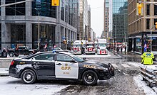 An Ontario Provincial Police officer patrols the Ottawa convoy occupation protest in 2022. Freedom Convoy 2022, Ottawa, February 12 (5).jpg