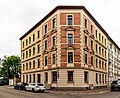 Apartment building in a semi-open area in a corner