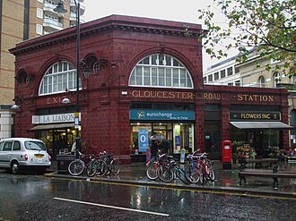 Gloucester Road station, Piccadilly line, with the sang de boeuf tiles used on many London Underground station buildings Gloucester Road stn former Piccadilly building look north.JPG