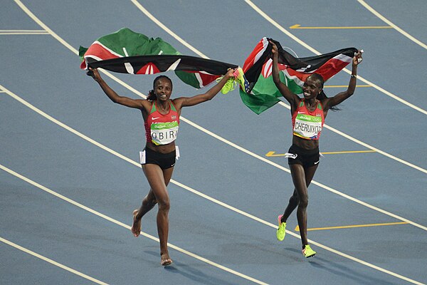 Vivian Cheruiyot (R) and Hellen Obiri (L), 1–2 in the 5000 m, celebrate their success at the 2016 Rio Olympics.