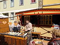 Kürtőskalács makers. Street fair. - Fortuna Street. Buda Castle Quarter, Budapest.JPG