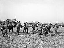 Pilots of No. 87 Squadron running for their Hawker Hurricanes while at Lille-Seclin airfield in France Lille-Seclin airfield - Royal Air Force 1939-1945 Fighter Command C468.jpg