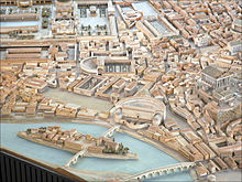 The plaza of the Circus Flaminius (left of the Theatre of Marcellus in the center), according to Italo Gismondi's model Maquette de Rome (musee de la civilisation romaine, Rome) (5911809378).jpg