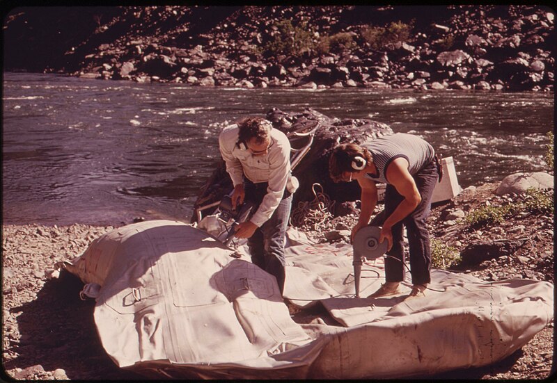 File:Members of wilderness expedition inflate a 28-foot raft at the beginning of a trip through Hells Canyon on the Snake River, 05-1973 (7065864993).jpg