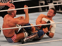 The Miz applying a figure-four leglock on Cesaro Miz figure 4.jpg