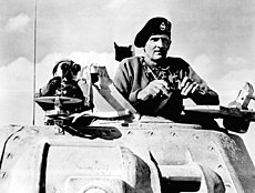 Montgomery watches his tanks move up.jpg
