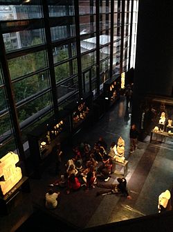 Schoolchildren visiting the Americas gallery, seen from the mezzanine