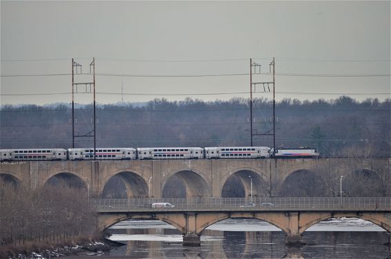 New Jersey Transit Northeast corridor train to New York crossing the Raritan River in Central New Jersey