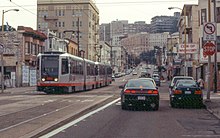 Married Pair, 2 Car MUNI LRV2/3 on the N Judah, San Francisco, CA. N Judah train crossing 10th Avenue, March 2001.jpg