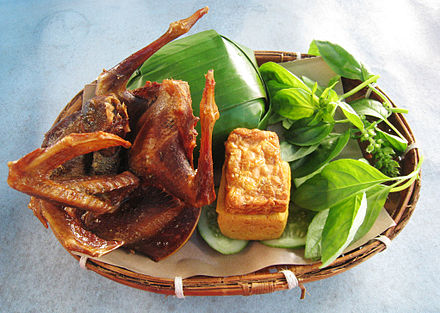 Nasi timbel with fried pigeon, tofu, and tempeh.