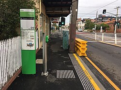 Tram stop with information board