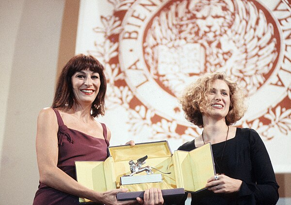 Huston presenting Jane Campion with the Grand Jury Prize at the 47th Venice International Film Festival